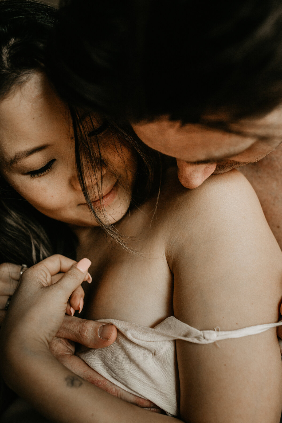 Intimate Boudoir Couples Photograph. For Melbourne Couples Photography Session In Home Lifestyle Photos. Fun Natural Sexy Photography. Sapphire and Stone Photography.
