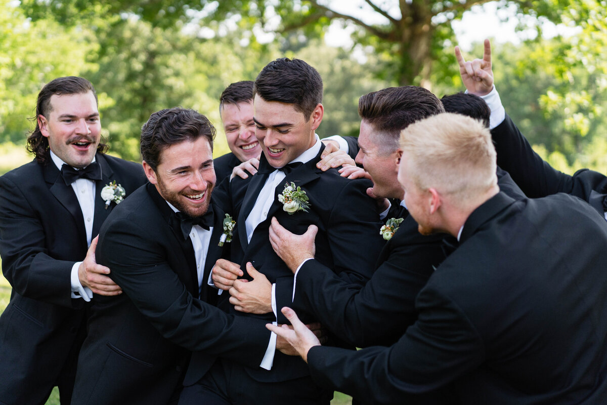 little-rock-wedding-black-white-photo-bride-groom-smiling-happy-wedding-tiffany-and-co-earrings-