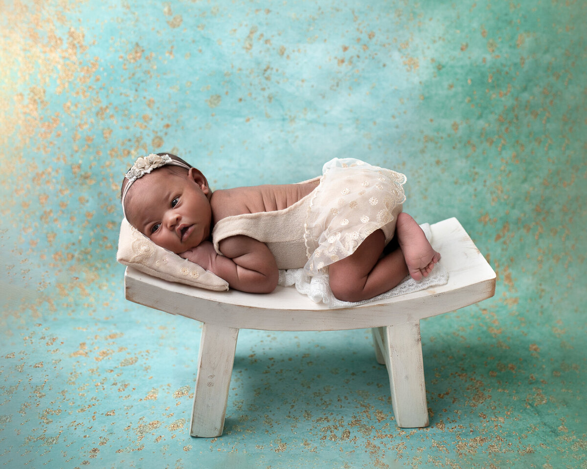Lovely newborn photography in a Creative tiny bed