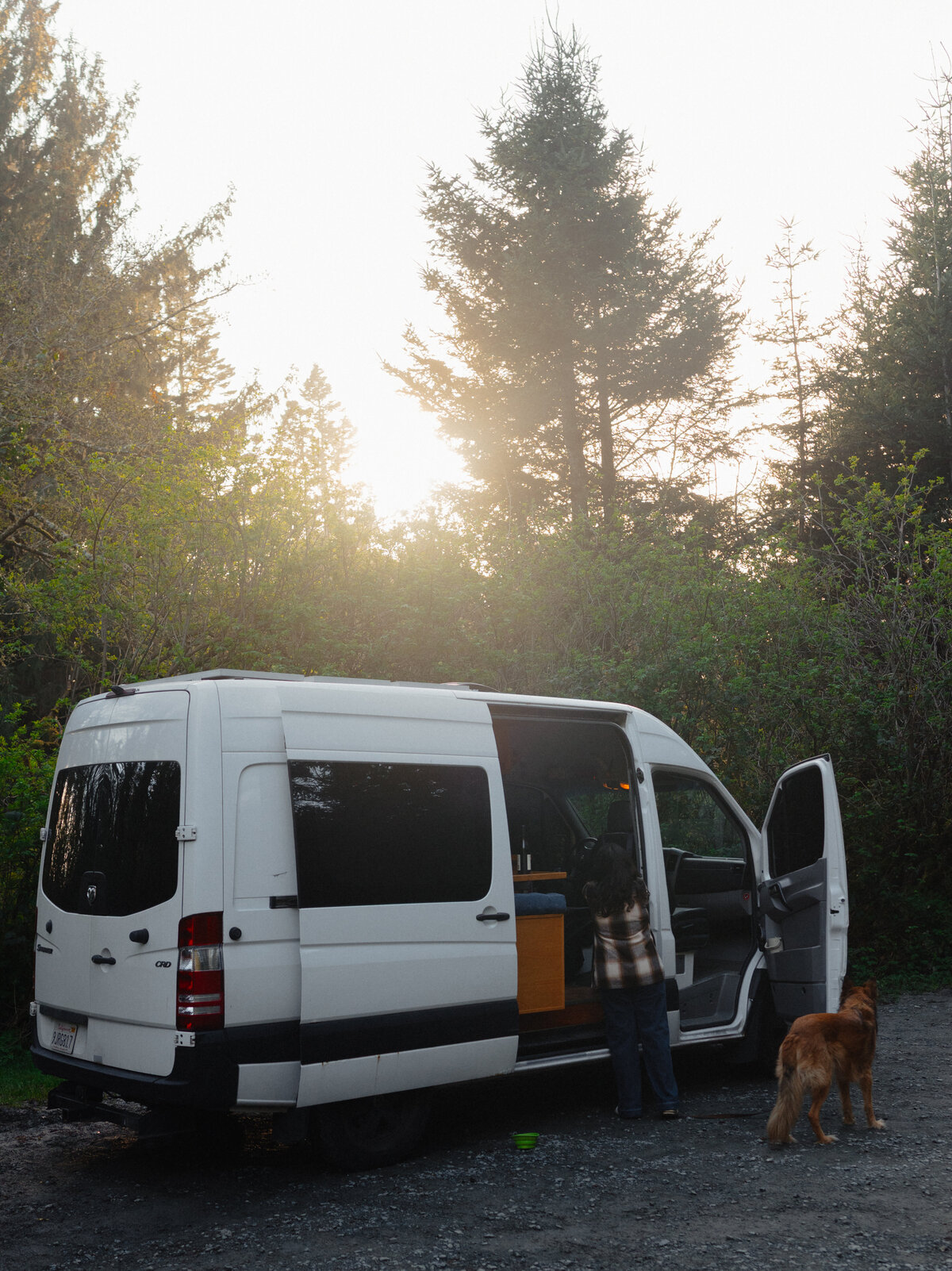 van life couple and their dog during golden hour in Bend, Oregon