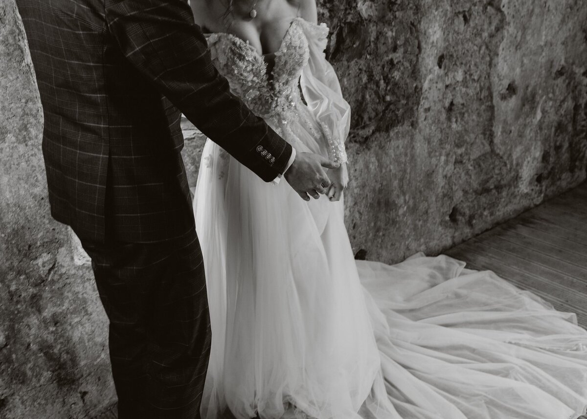 Bride and groom have their couple portraits in the castle