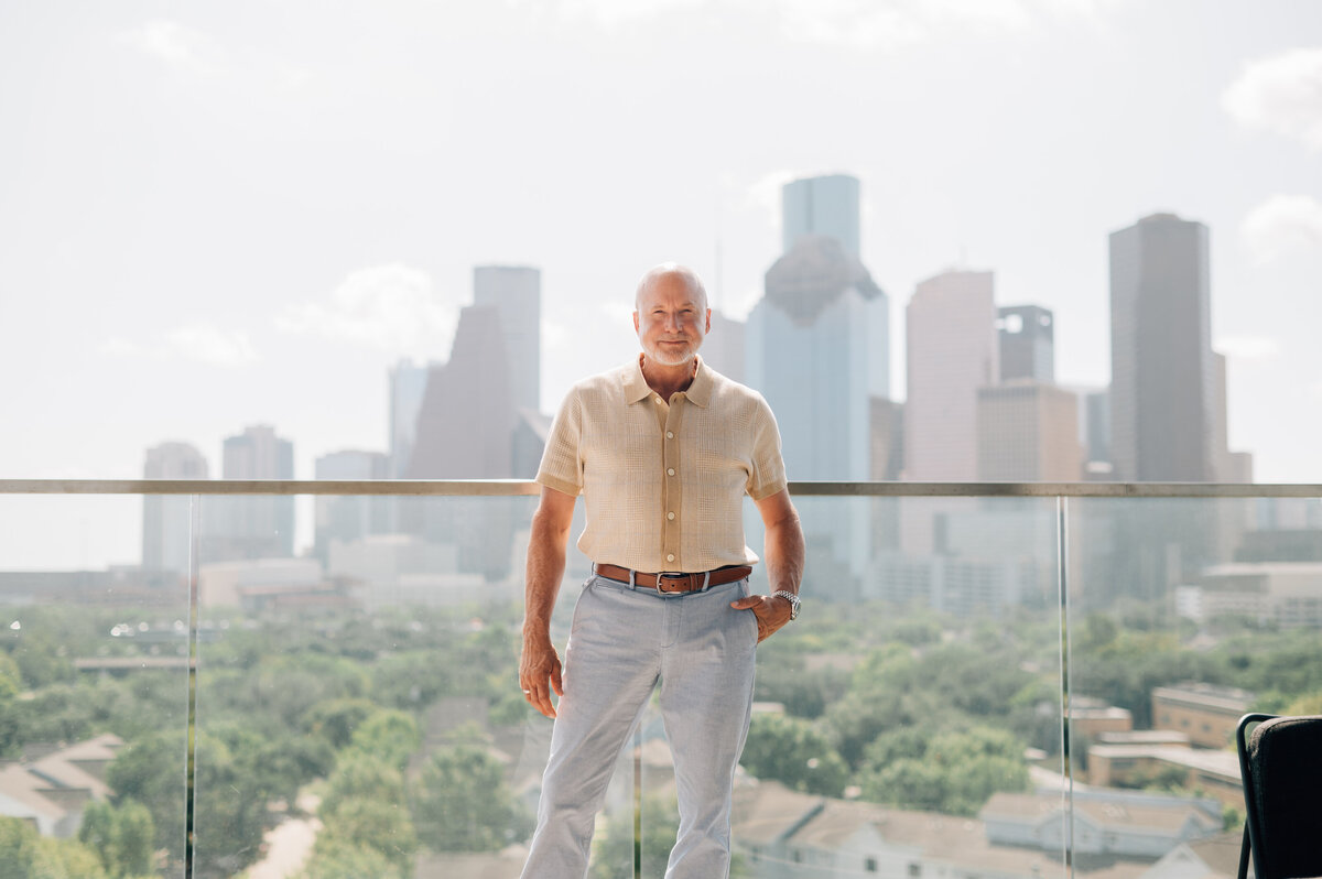 Rooftop office photoshoot of businessman by Houston headshot photographer