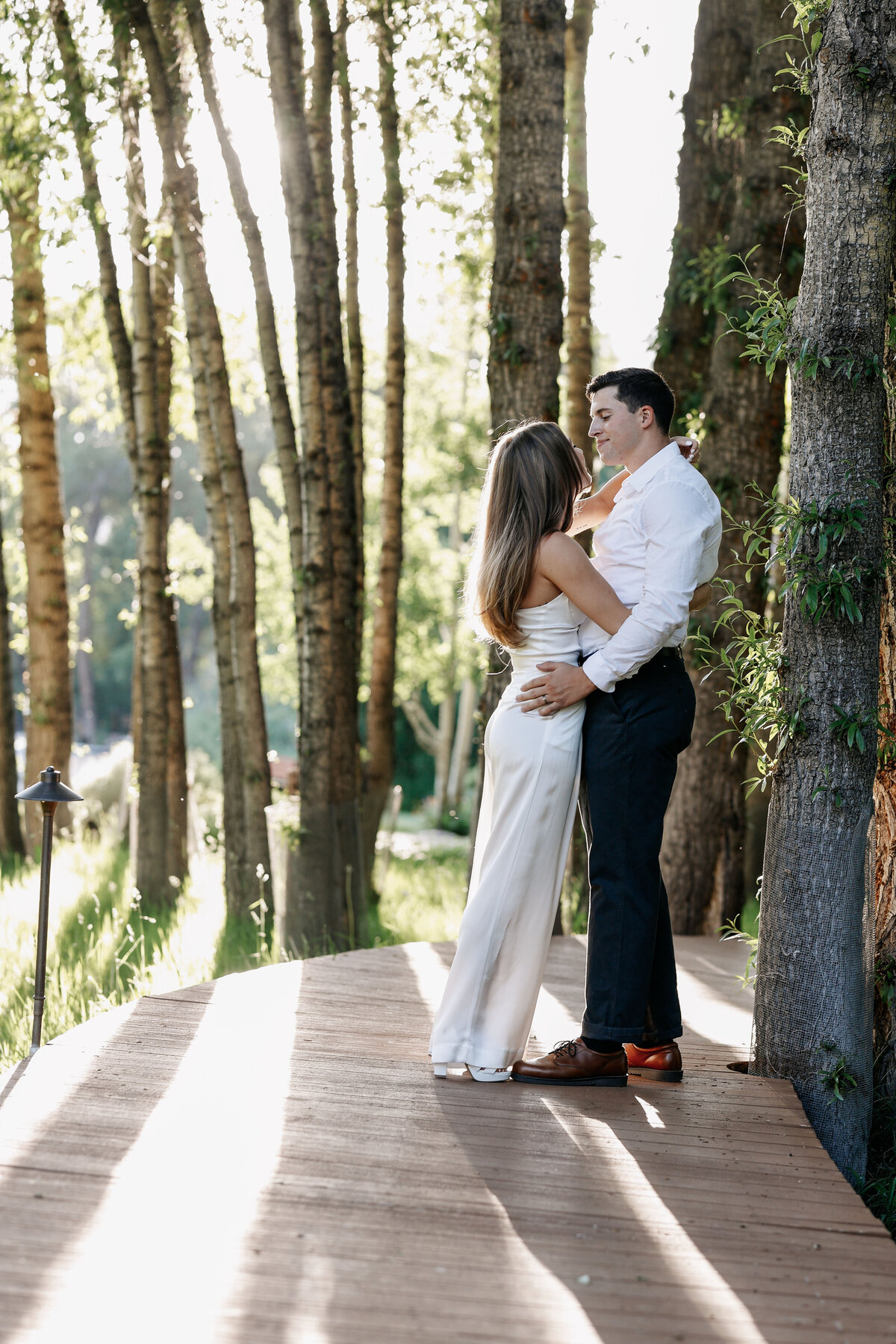 A golden hour moment between the bride and groom, in an aspen wedding,