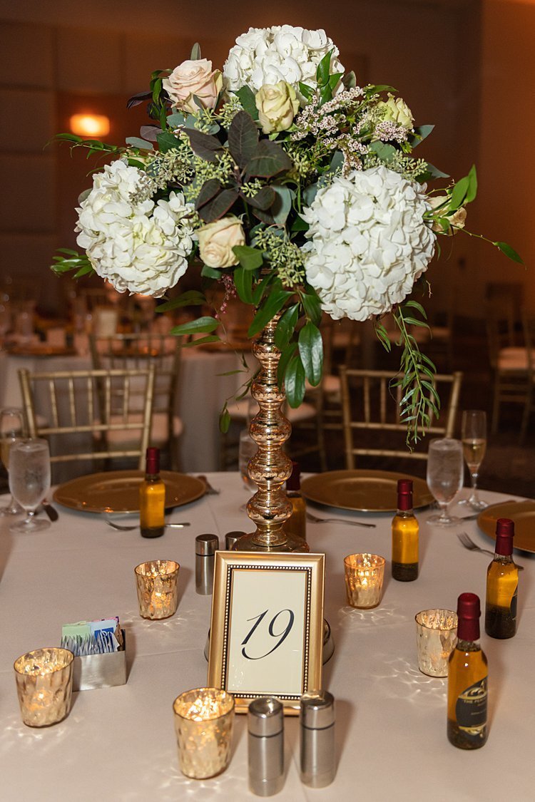 Tall floral centerpiece with hydrangeas at Hyatt Regency Pittsburgh Airport wedding reception