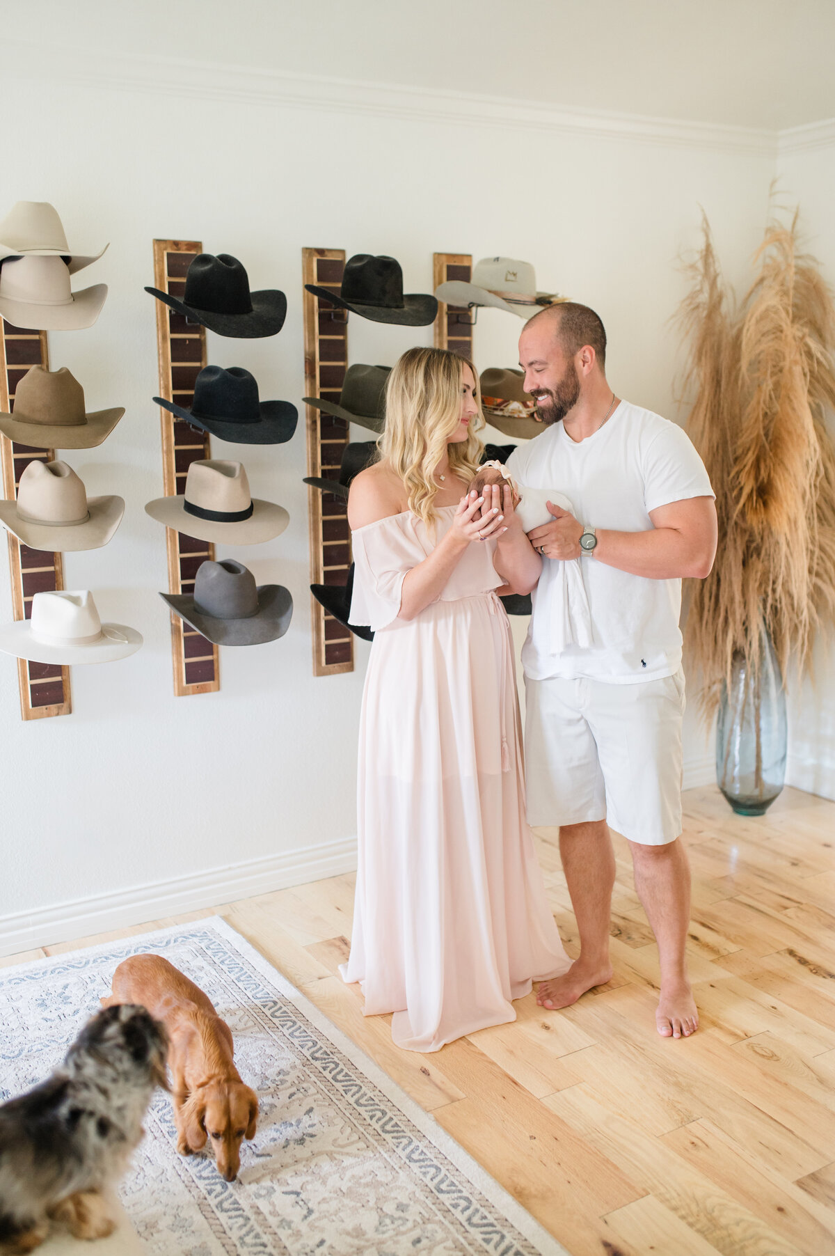 Family of three with cowboy hat wall