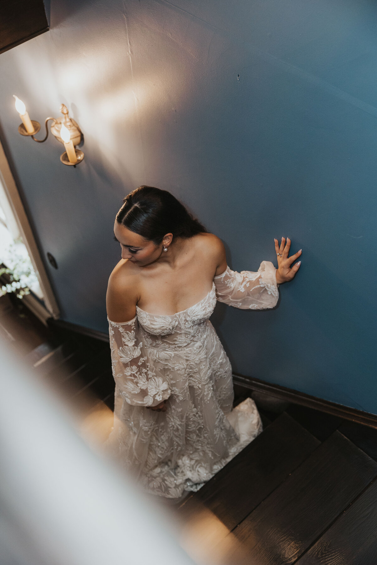 bride walking up steps in a victorian house in cleveland