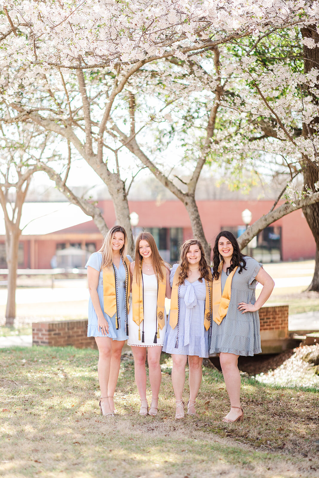 Group of friends smiling during senior session at Wingate