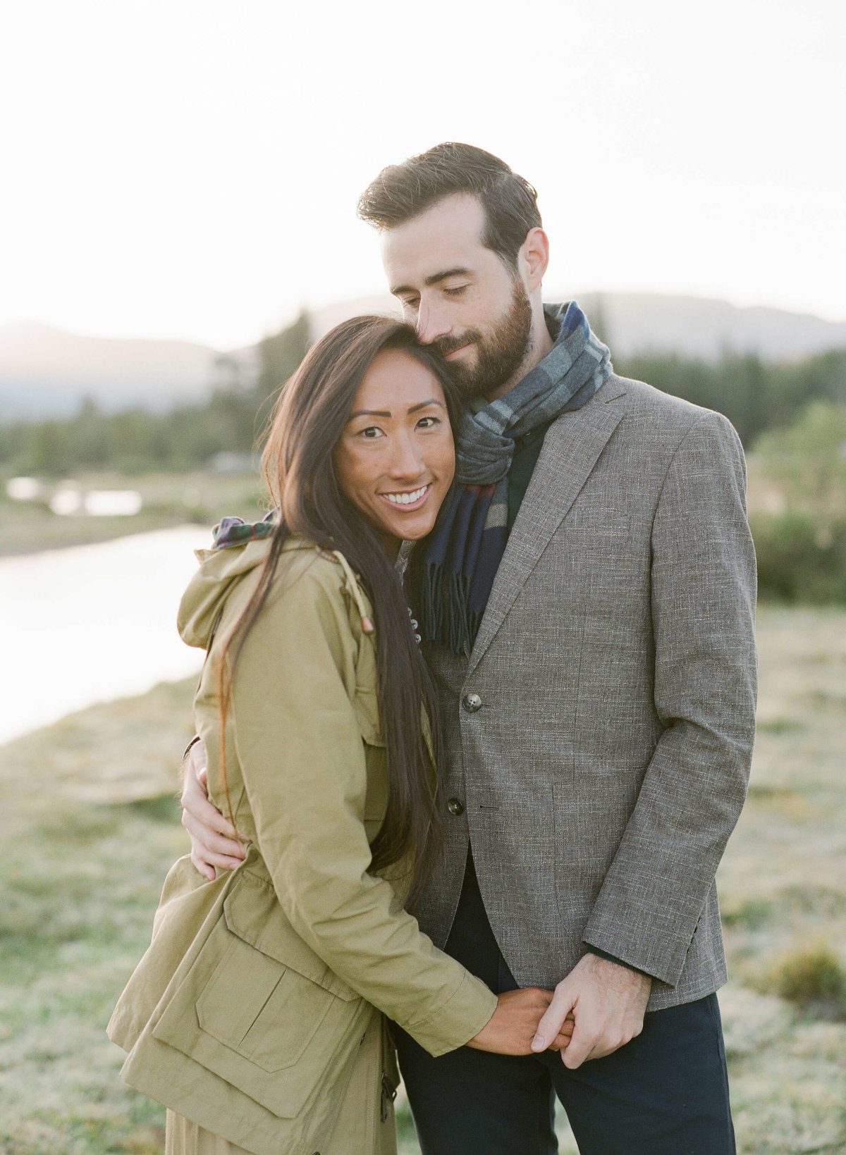 13-KTMerry-destination-engagement-photography-couple-hugging-Yosemite