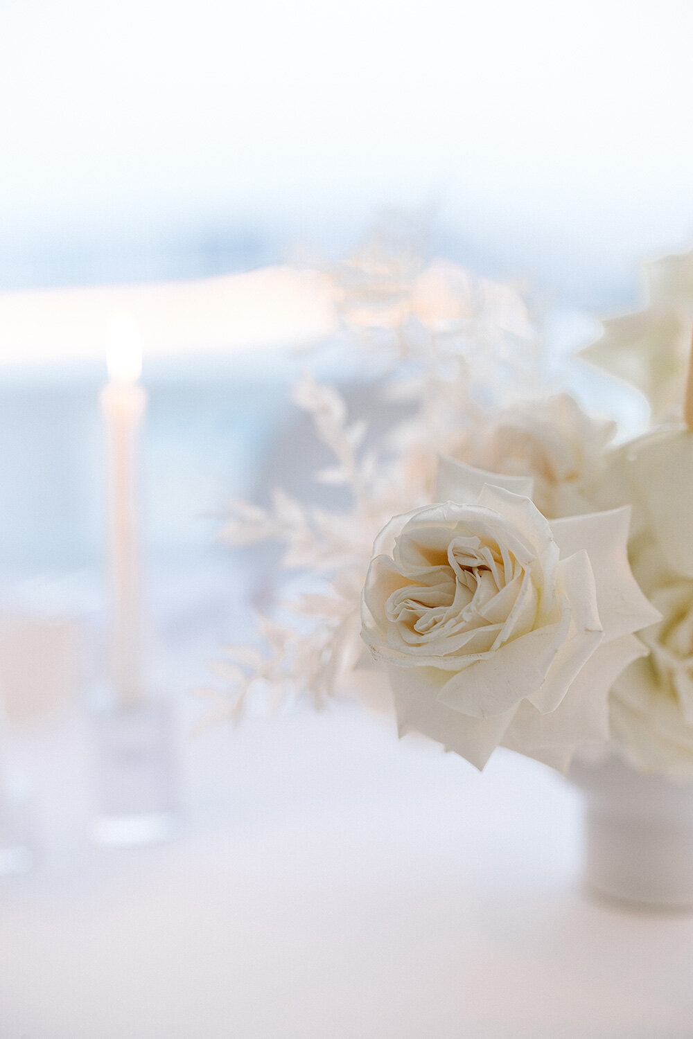 modern minimalist all white wedding table setting