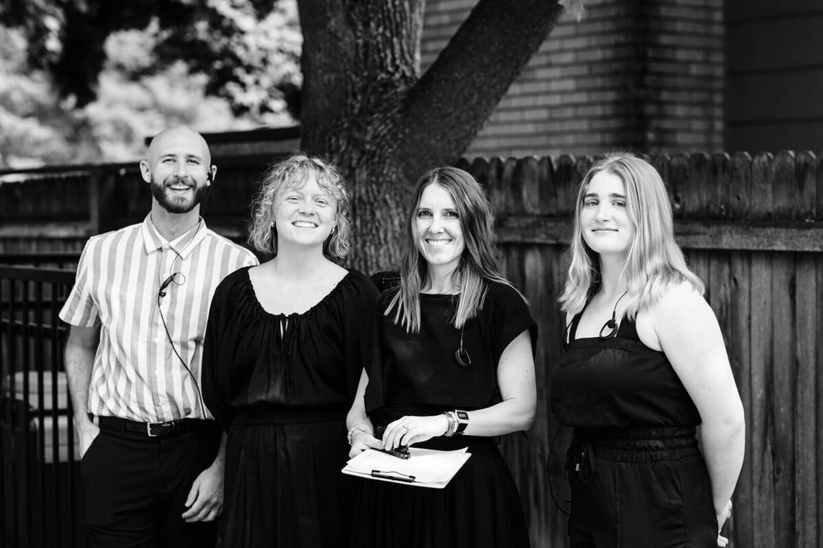 The team of planners from Perfect Thirds and Co smile at the camera at a wedding they planned in Boise. 