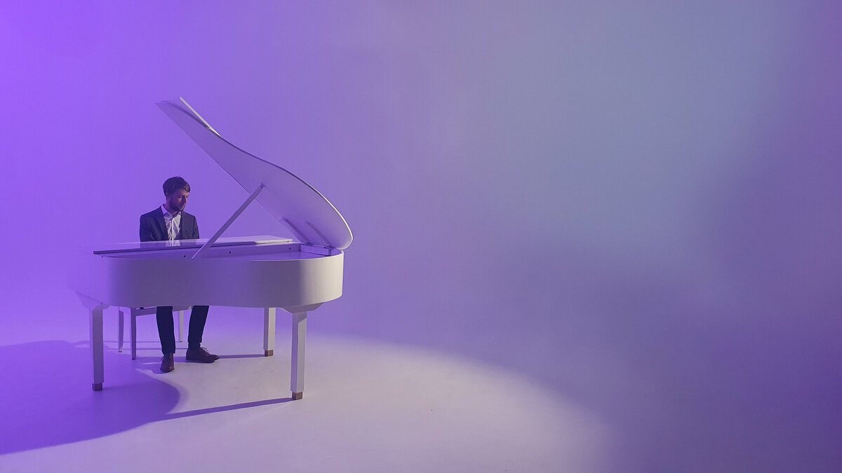 white baby grand piano hire for stage show