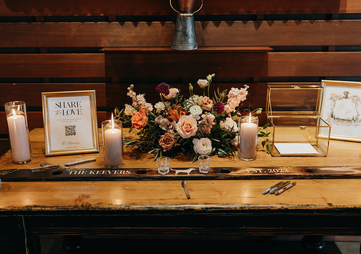 Welcome table with flowers and candles at the Range clubhouse at Brasada Ranch in Powell Butte