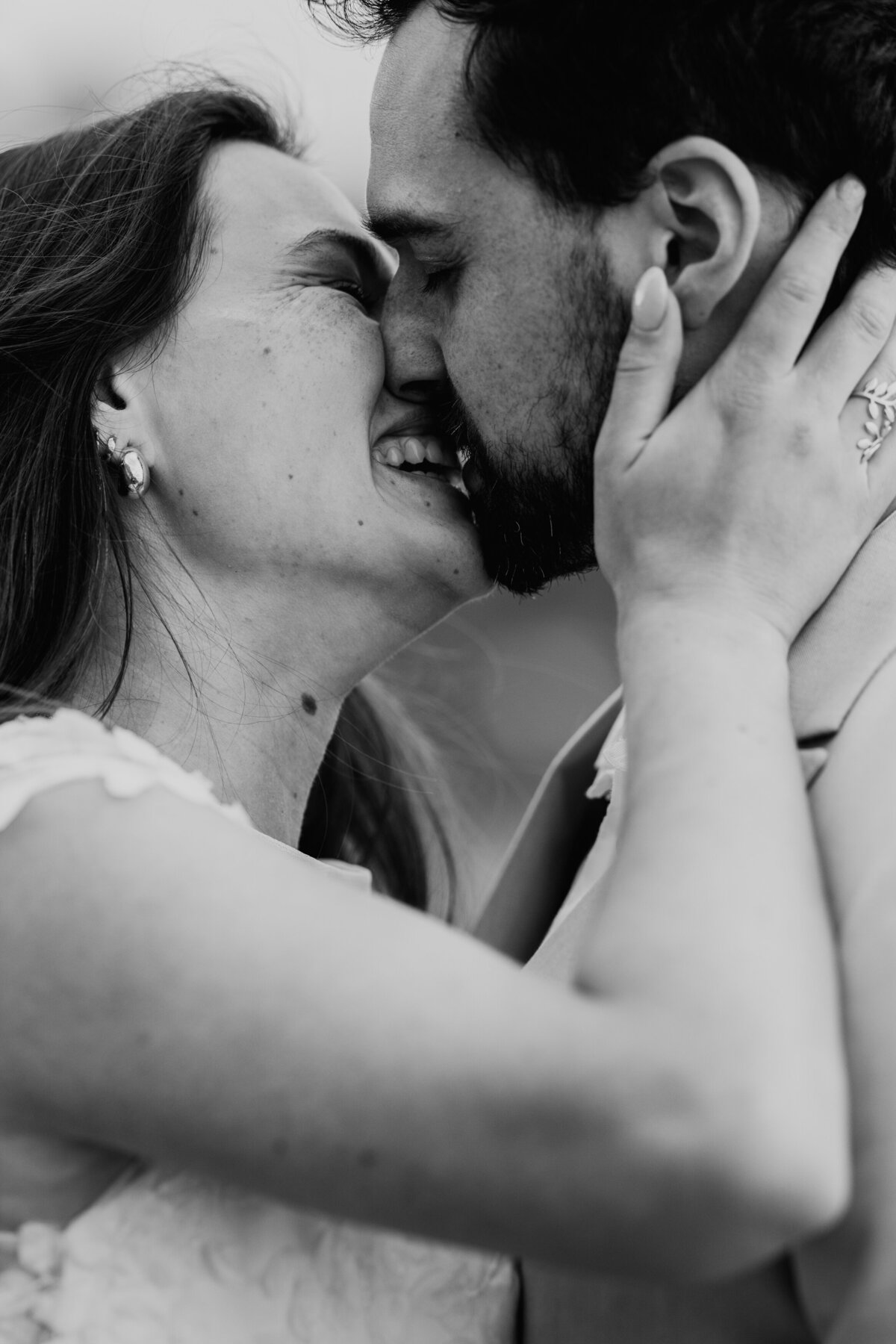 Black and white kiss of eloping couple in Switzerland