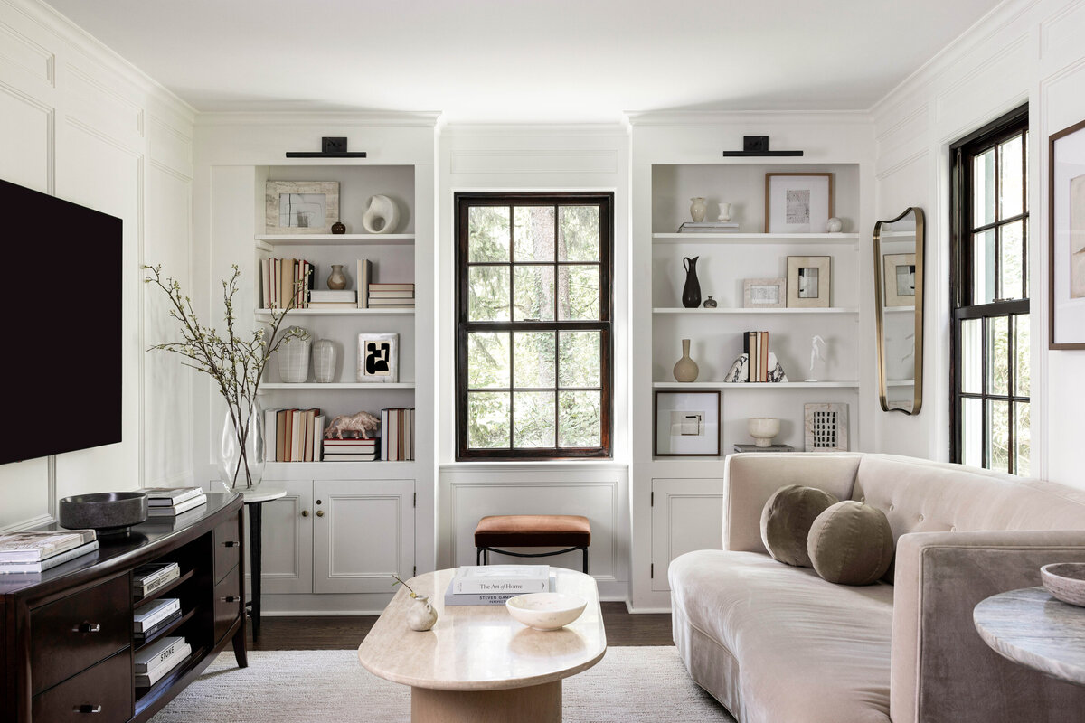 Elegant living room with custom built-ins, layered neutral textures, and sculptural accents designed by Deni + Dove Interiors — serving luxury interior design clients in Short Hills, Chatham, Summit, Ridgewood, Montclair, and Madison, NJ.

