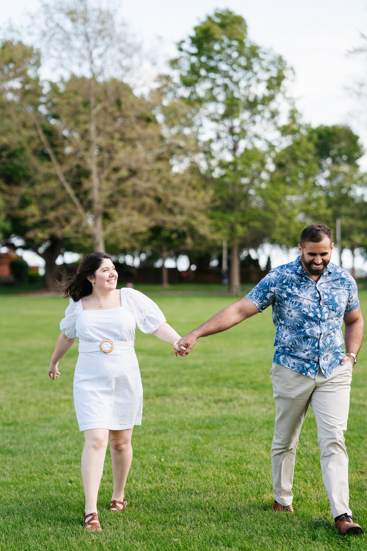 Natural light engagement portrait at Lynch Park’s rose garden in Beverly, Massachusetts