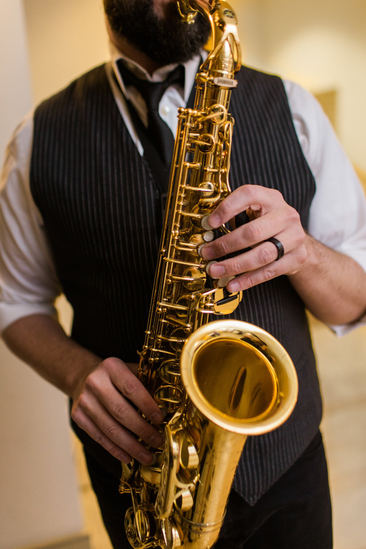 This cocktail hour wedding music was amazing with this saxophone player.  Biltmore wedding photographer Rebecca Cerasani.