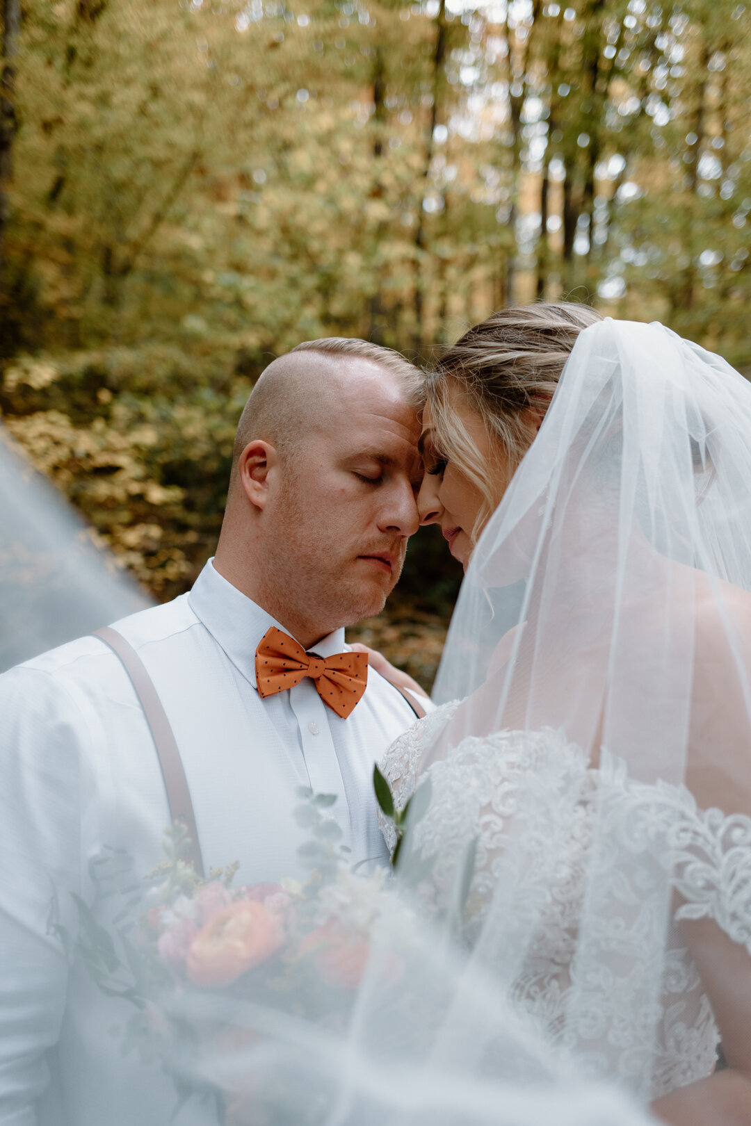 Intimate bride and groom portrait at their summer elopement in Tennessee.