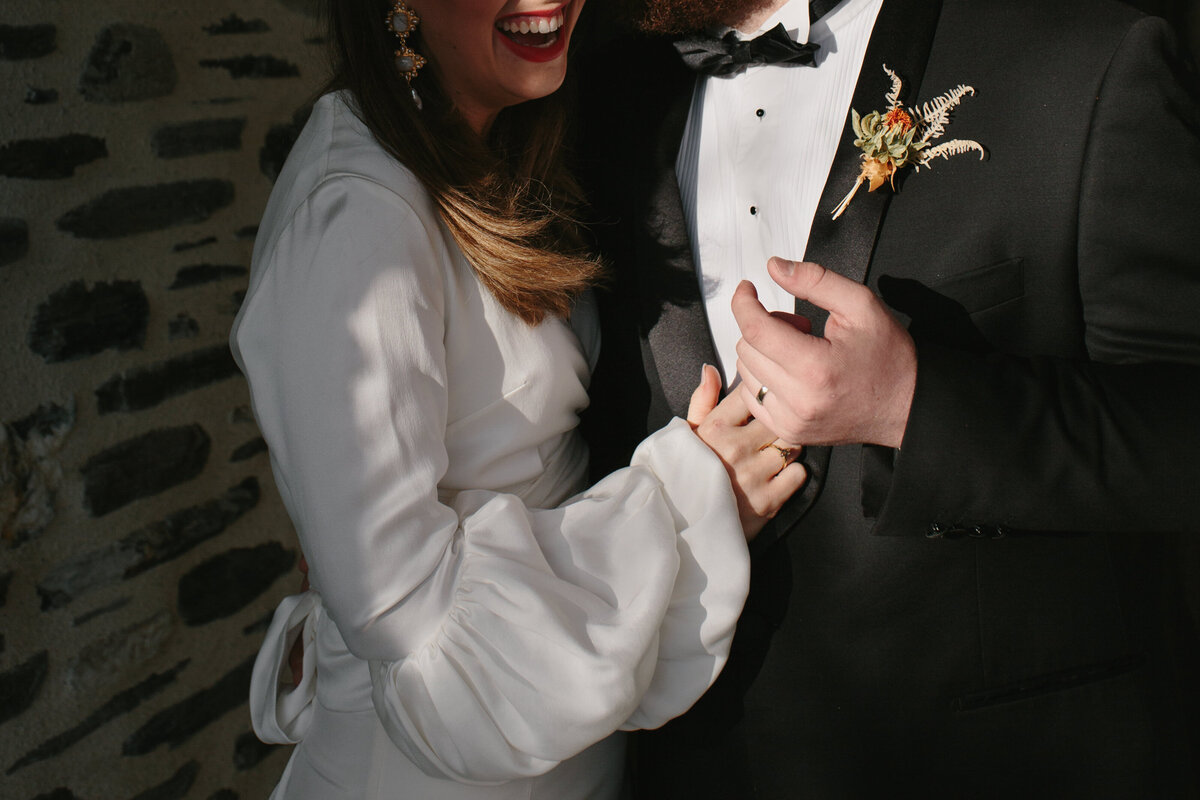 The Lovers Elopement Co - bride and groom embrace and laugh - elopement weddign