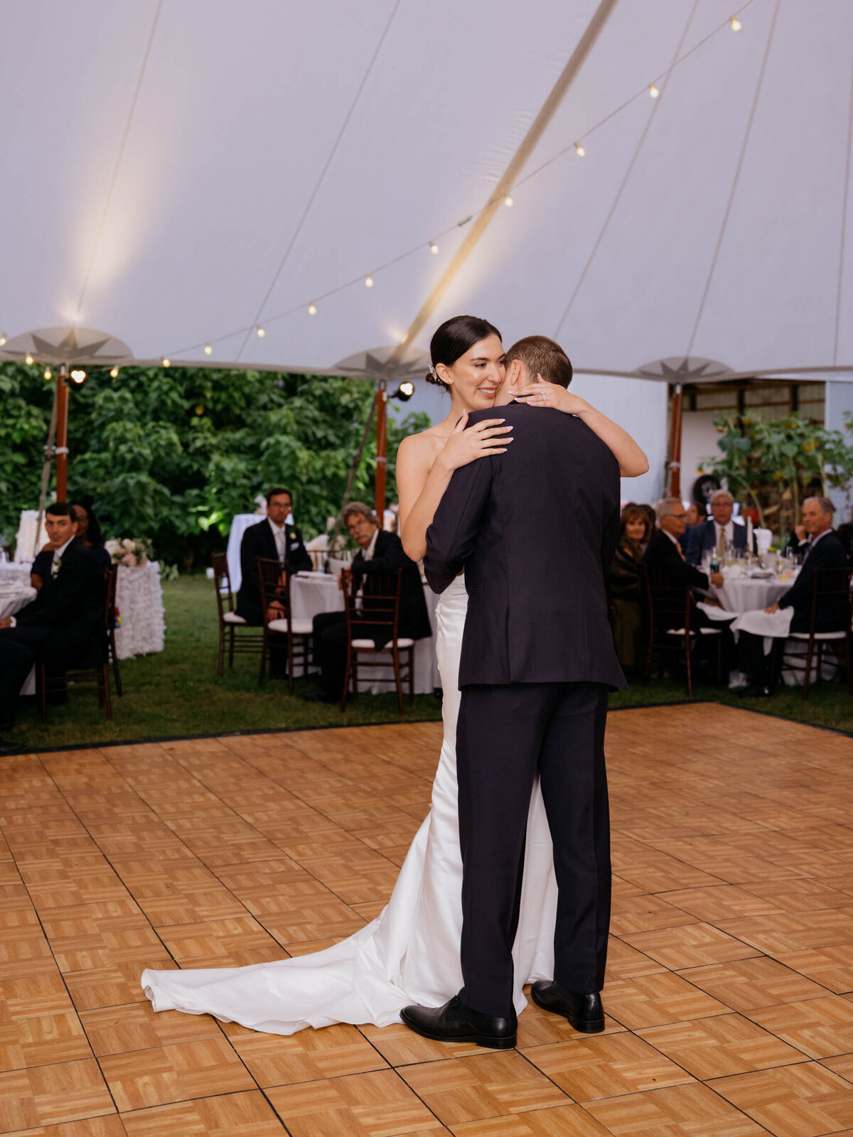 Elegant tented reception at private estate wedding.