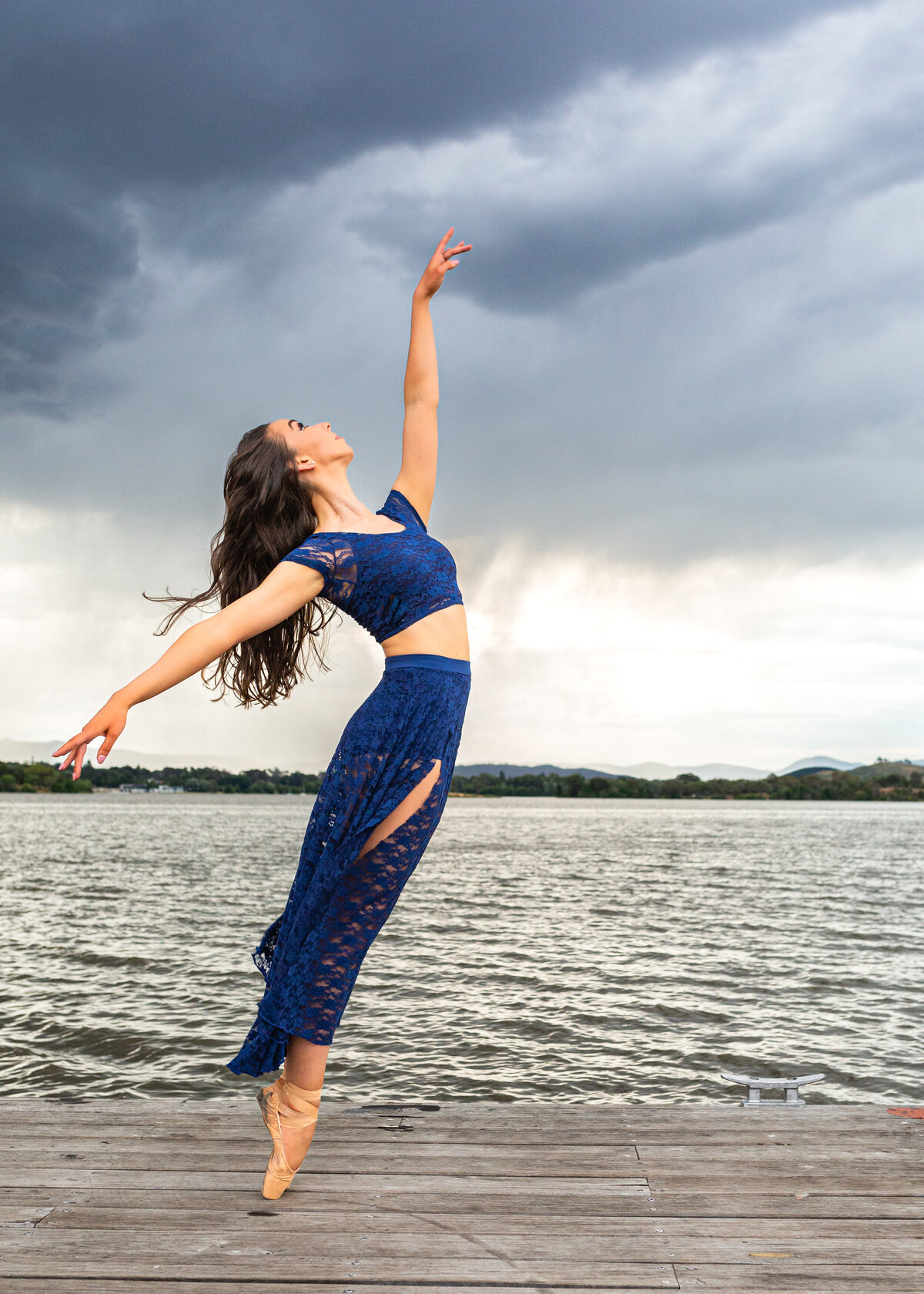 dancer pose lake thunderstorm Canberra