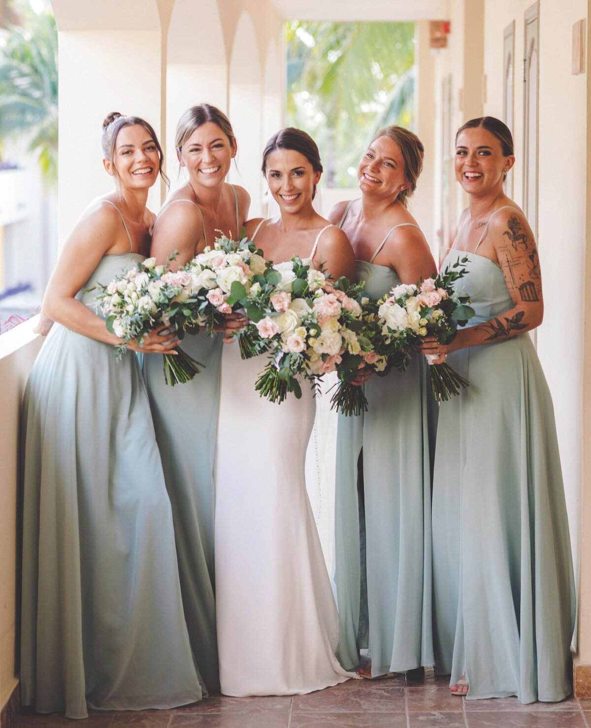 bridesmaids with bride before wedding in Riviera Maya