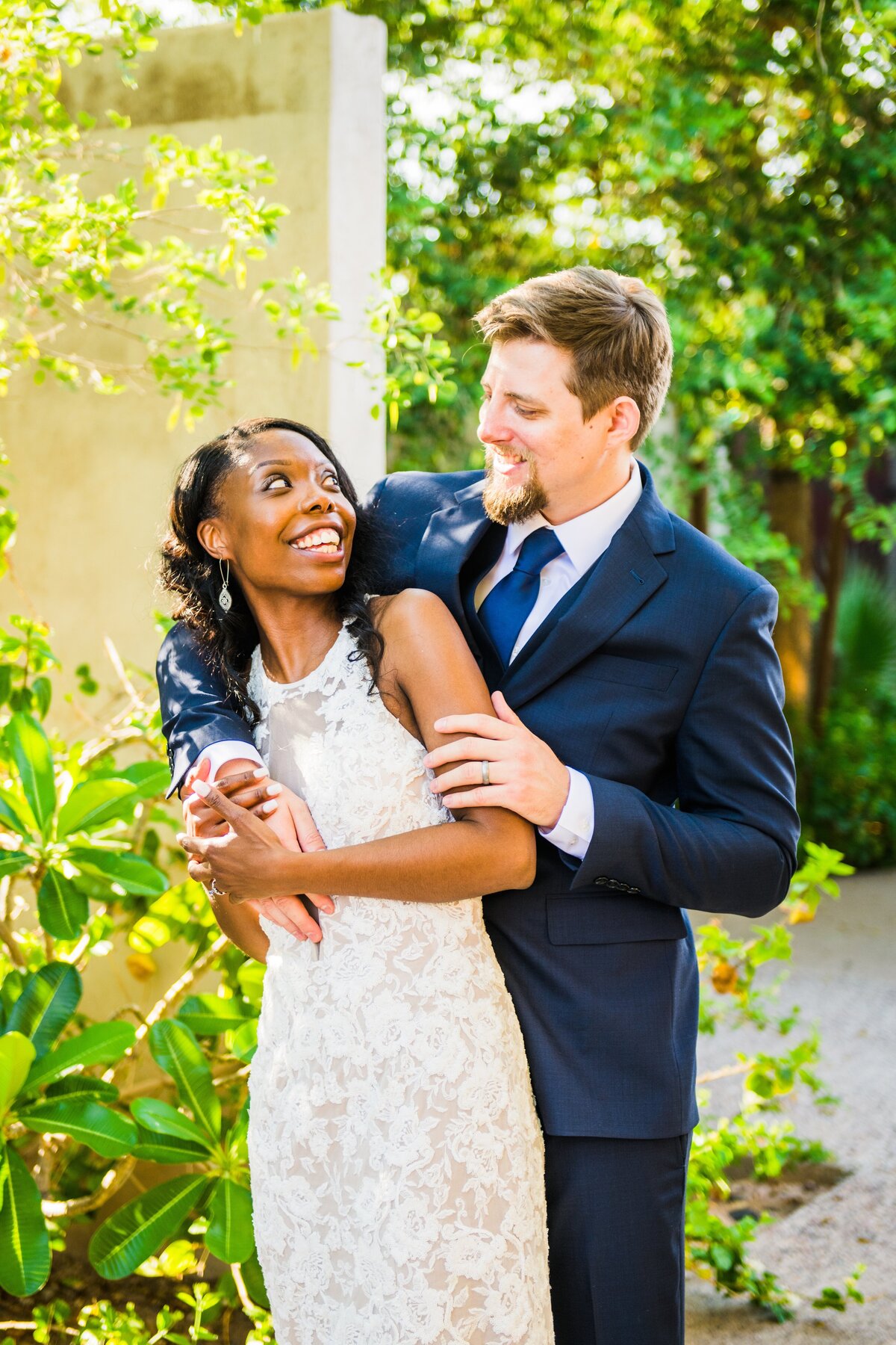 Bride and Groom smiling at each other Warehouse 215 Downtown Phoenix wedding