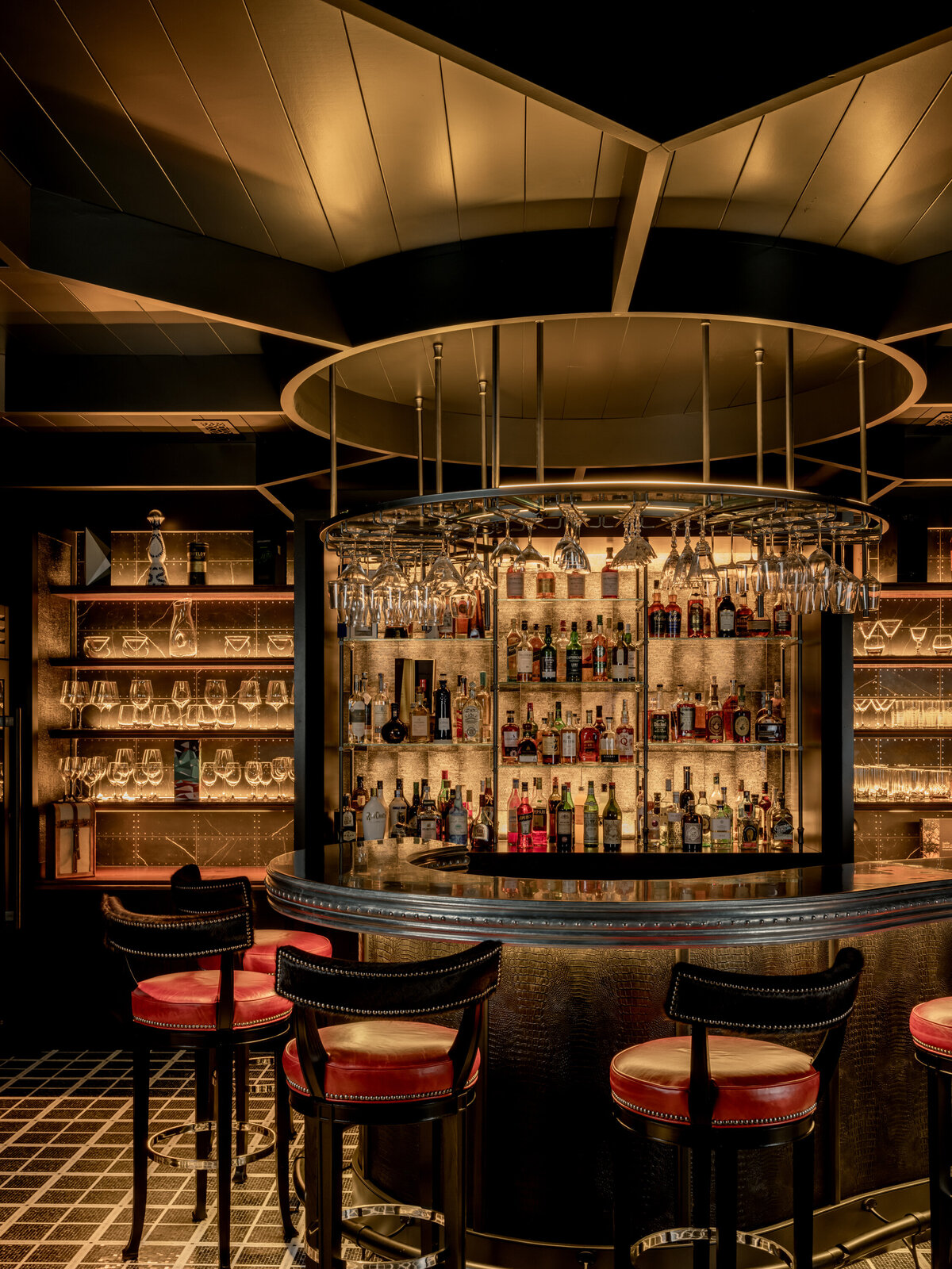 moody bar with red bar stools