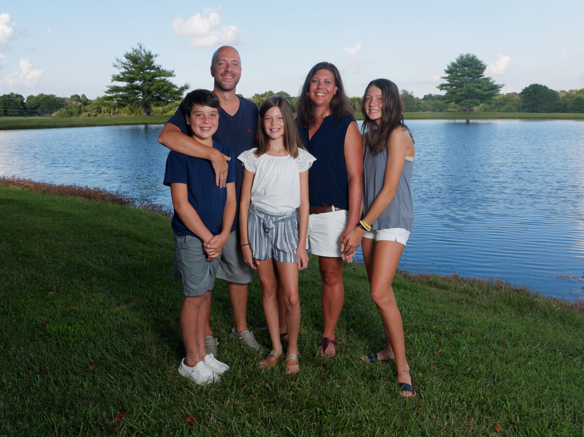 family by lake outdoor daytime portrait