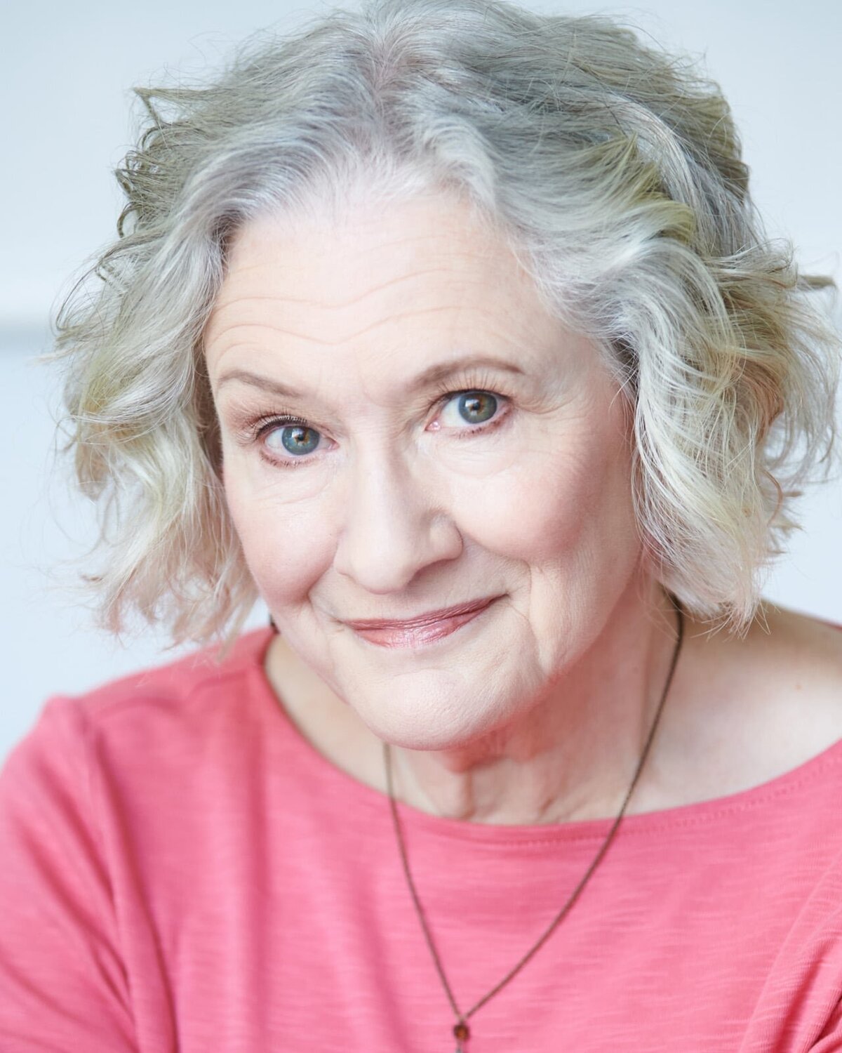 Professional Headshot Photographer in Minneapolis Captures Smiling Elderly Woman-21