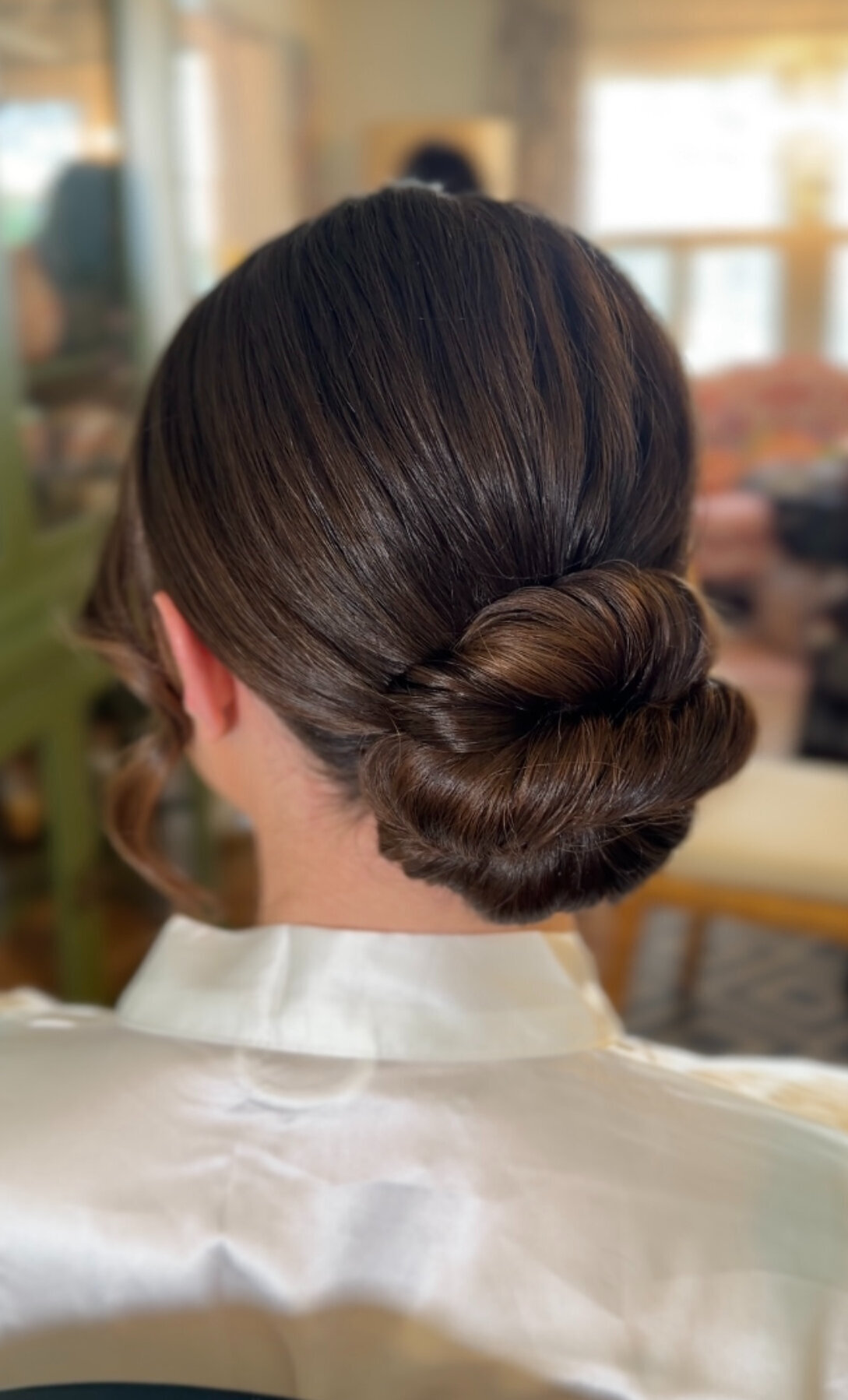 sleek low bridal bun updo