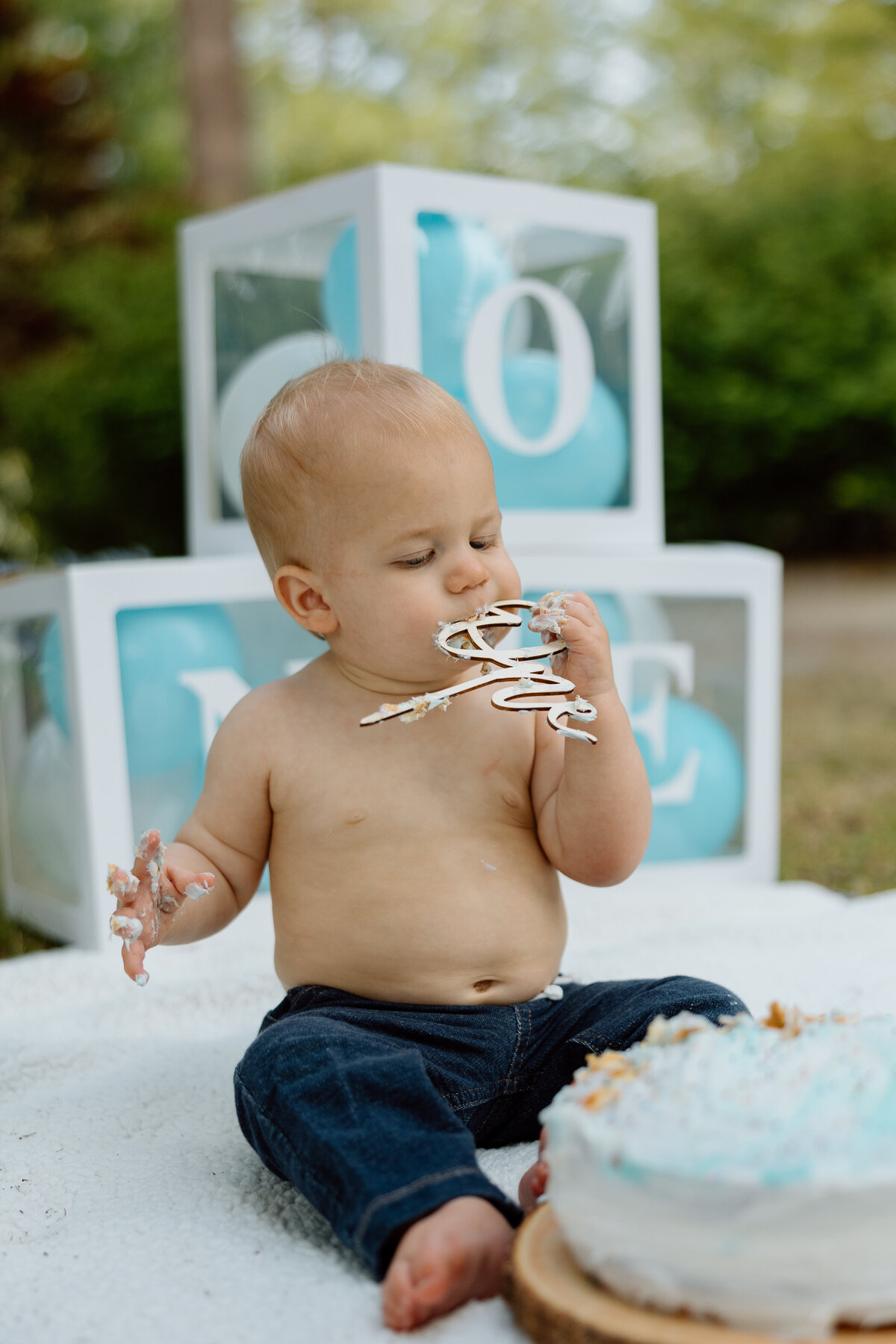 Baby's first birthday photoshoot with a smash cake