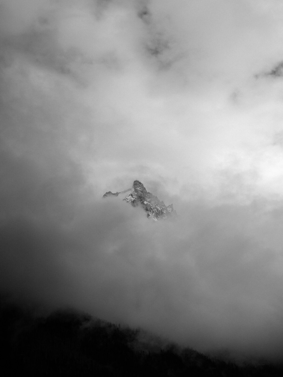 The Aguille du Midi in clouds from Chamonix