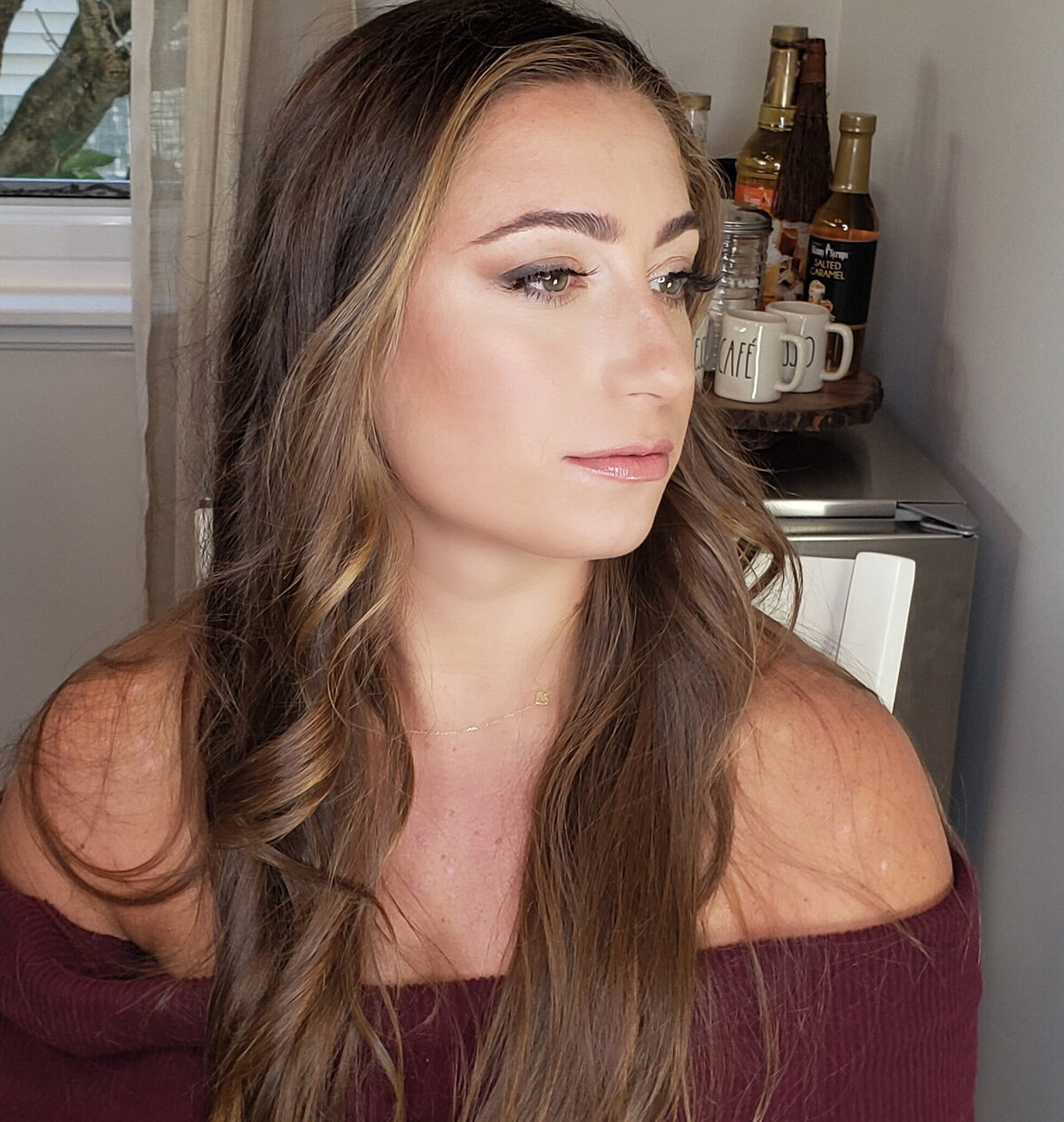 Side profile of glam look with glowing cheek highlight – Fairfield County makeup by Lydia Arroyo.