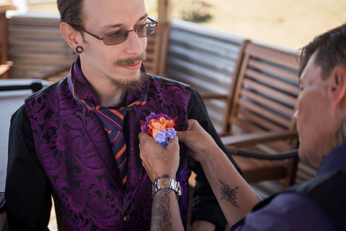 Elegant wedding rings on flower petals