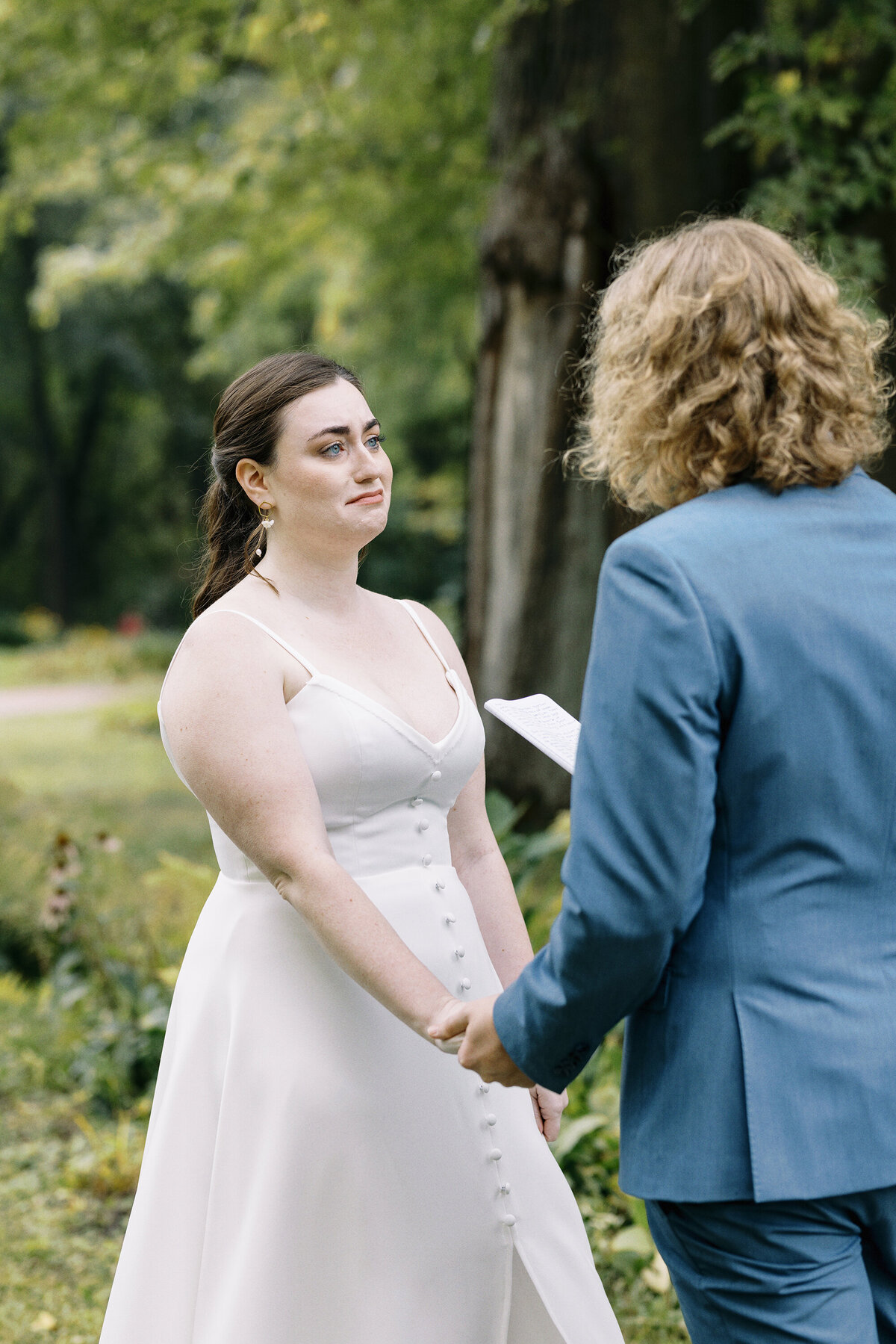 Intimate wedding at outing lodge. photos of bride and groom out on lawn (2)
