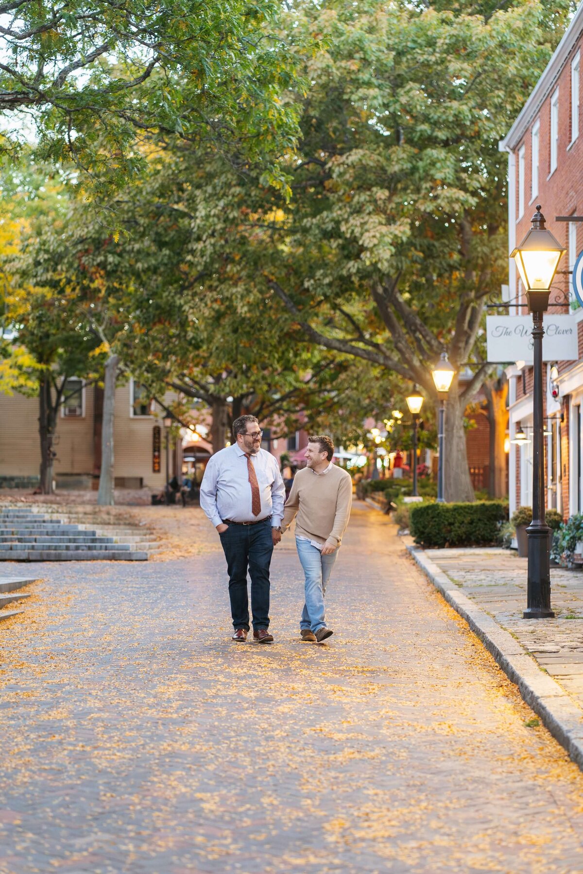 couple walking in newburyport for engagement photos