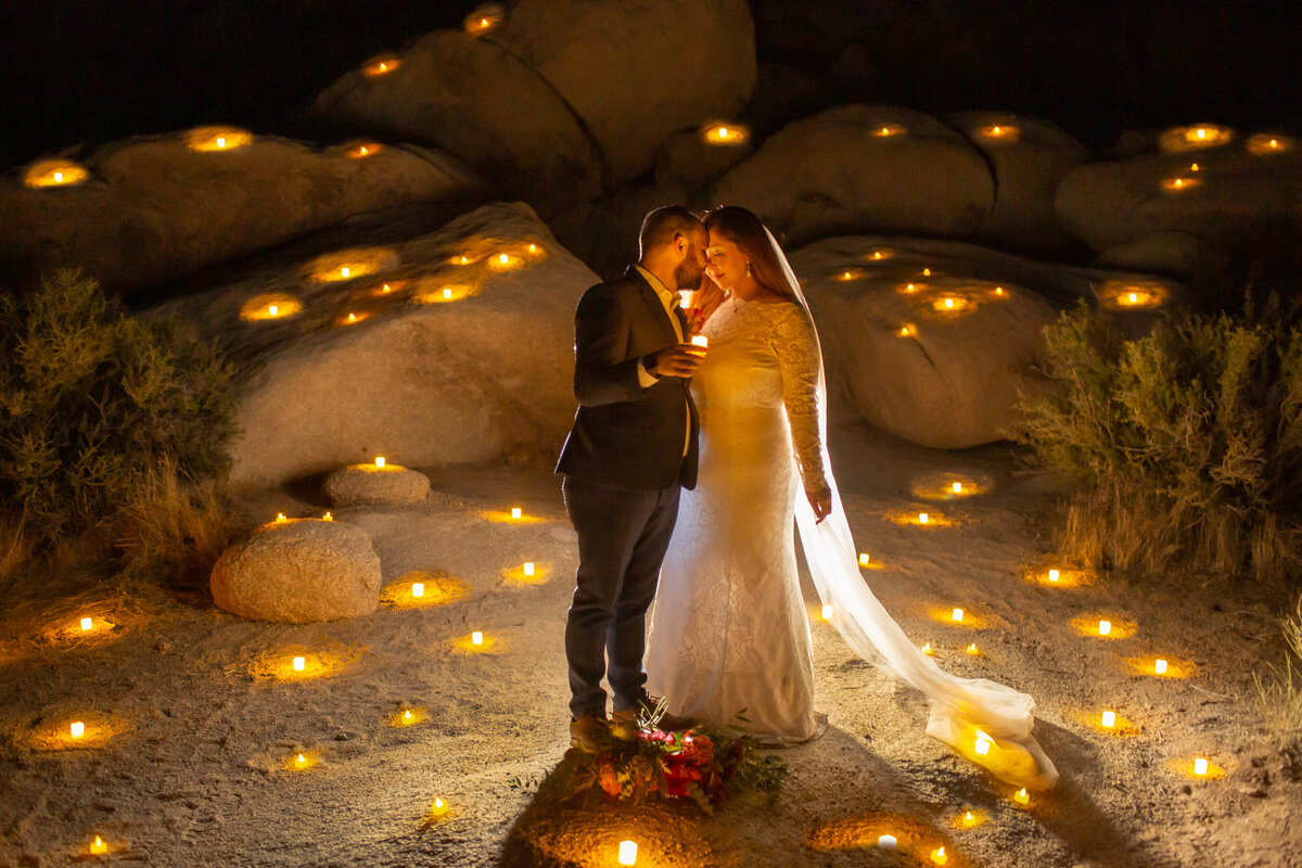 couple surrounded by candles