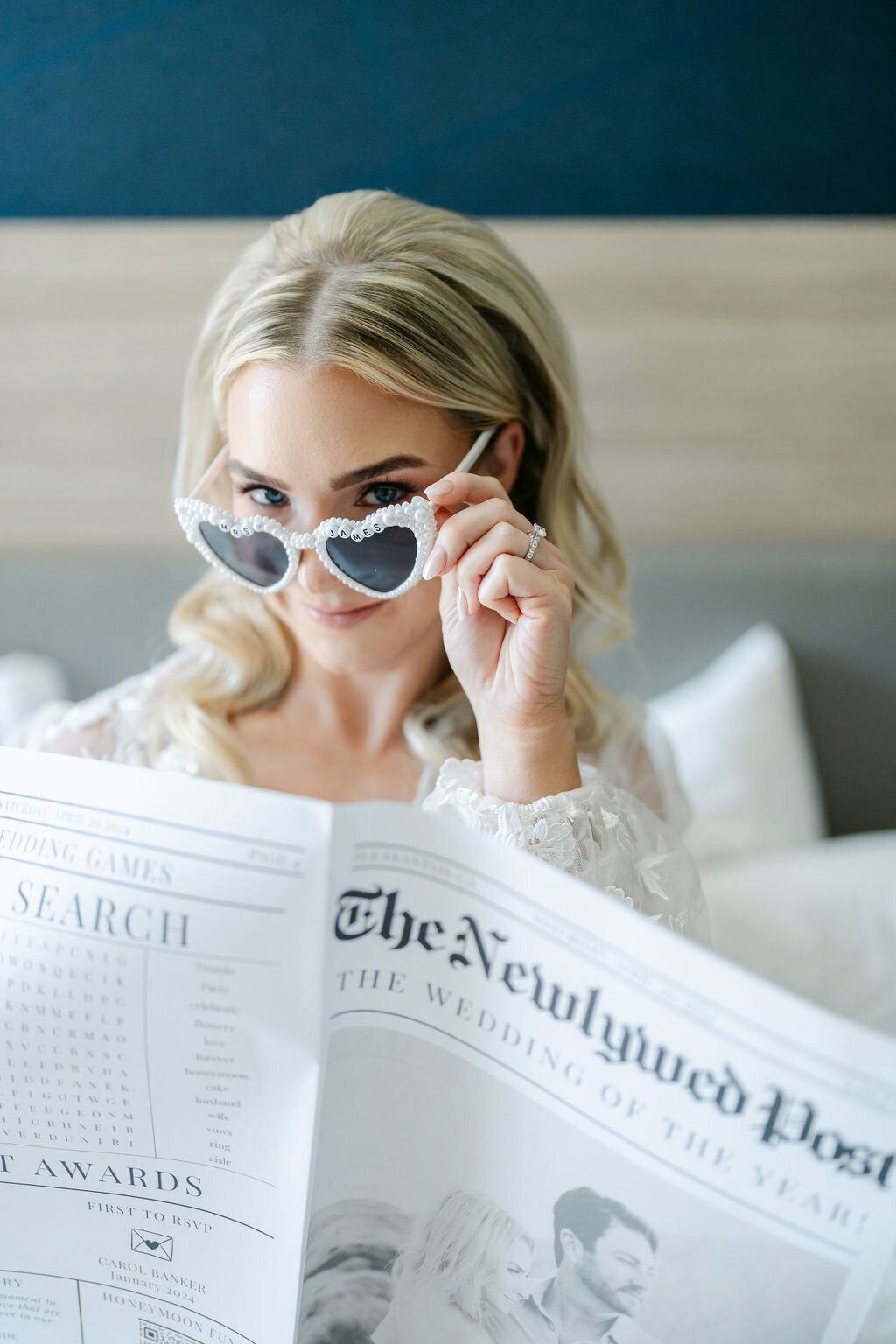 bride getting ready, newspaper, sunglasses