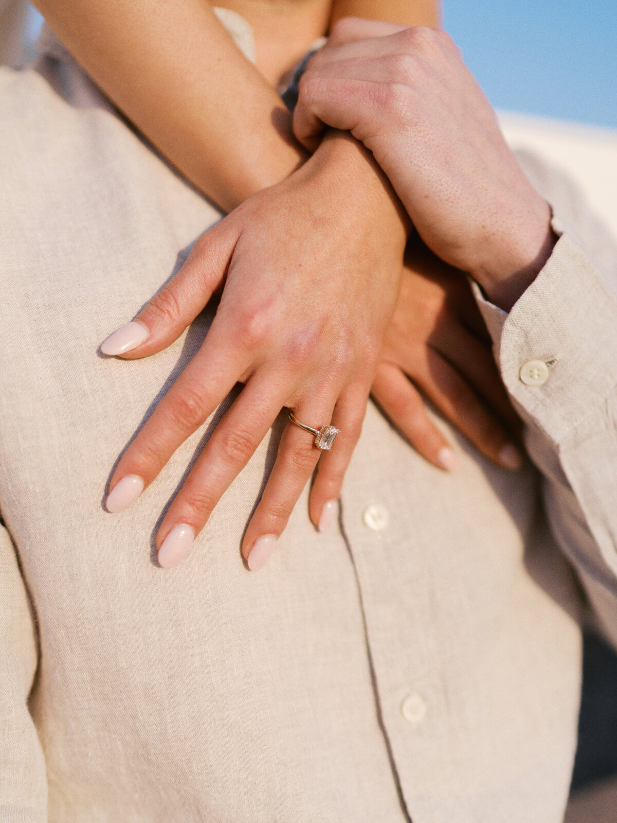 engagement-ring-holding-hands