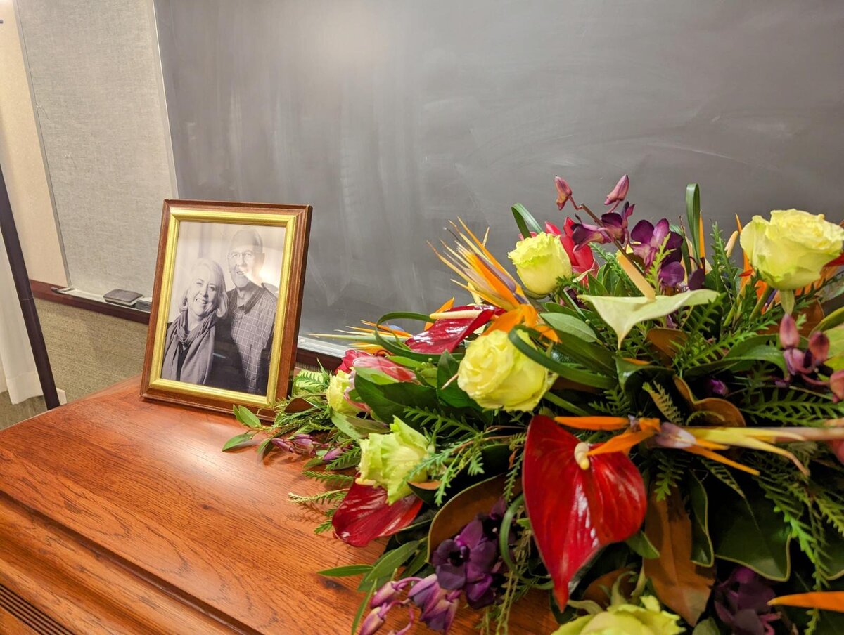 tropical casket funeral flowers at White Pine Funeral Home