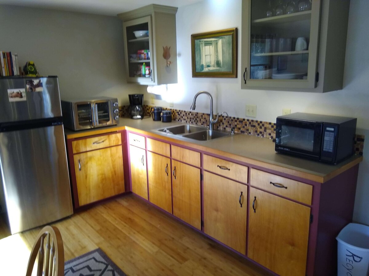 View of kitchenette with sun shining in.
