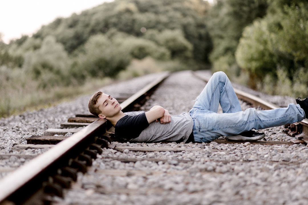 Senior session on railroad tracks