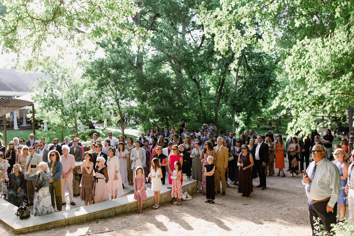Outdoor wedding ceremony at Umlauf Sculpture Garden, Austin