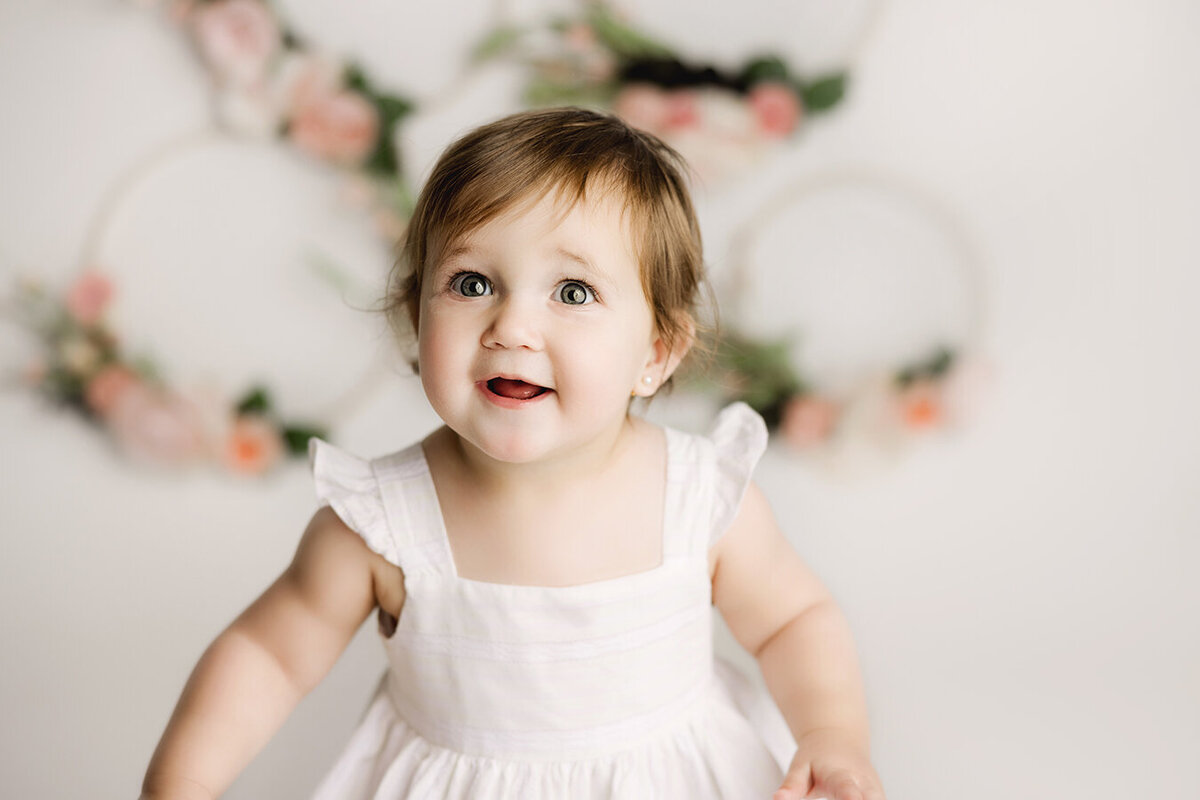 Fort Collins one year old baby girl with flowers