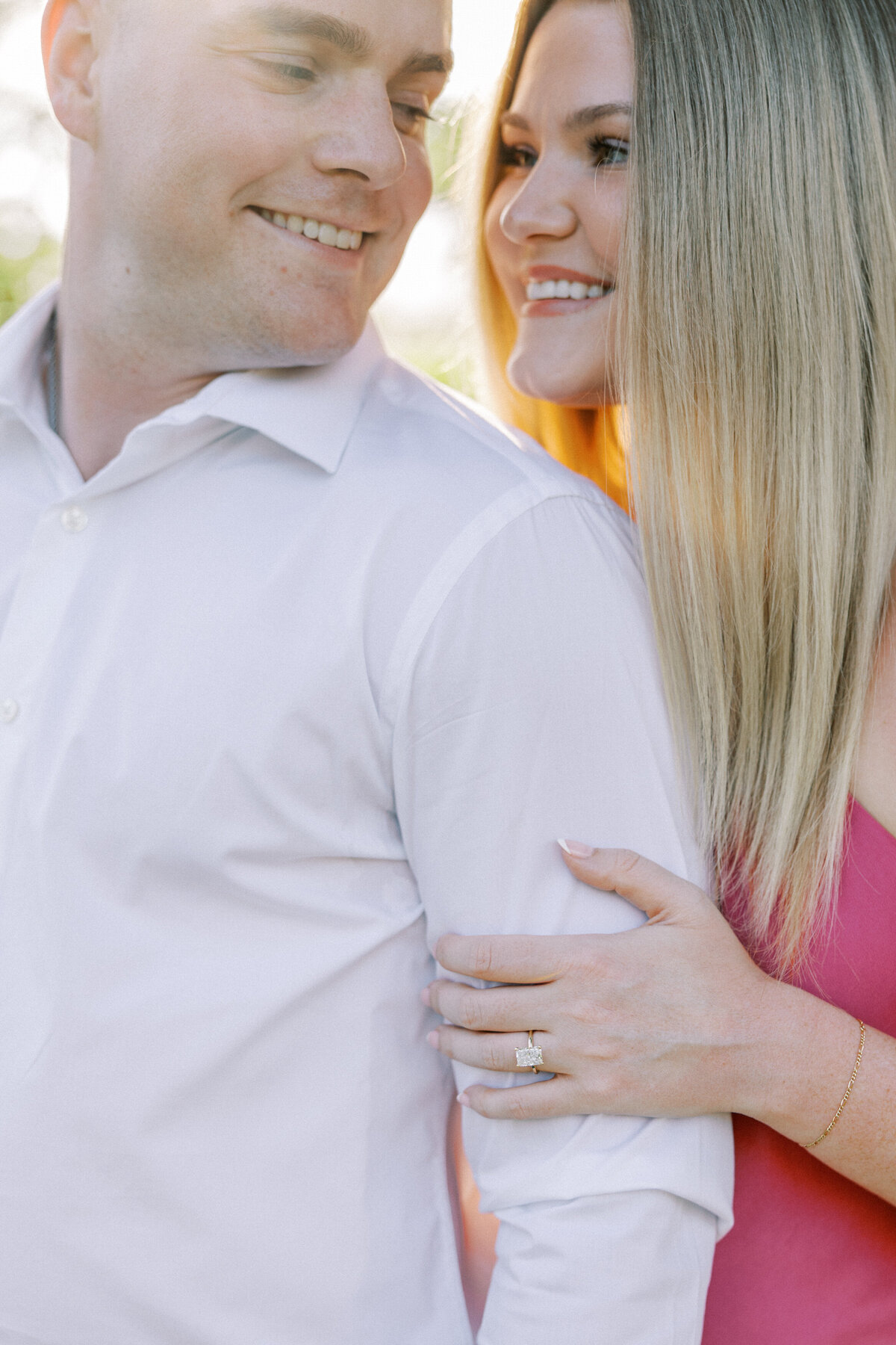 Close-up of engagement ring and couple smiling at each other, Columbus session by Philadelphia photographer.