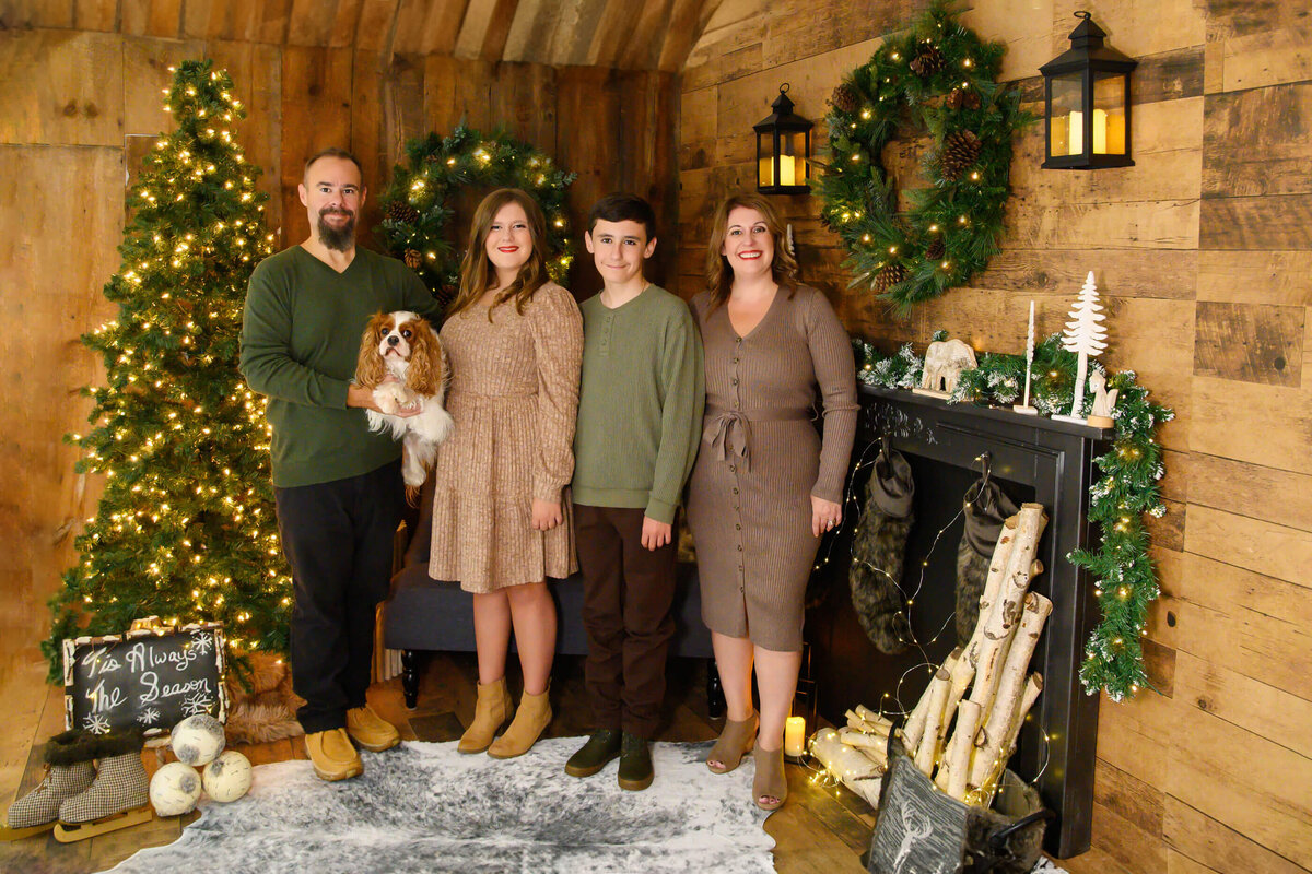 The Gibson family with their family pet, Parker.