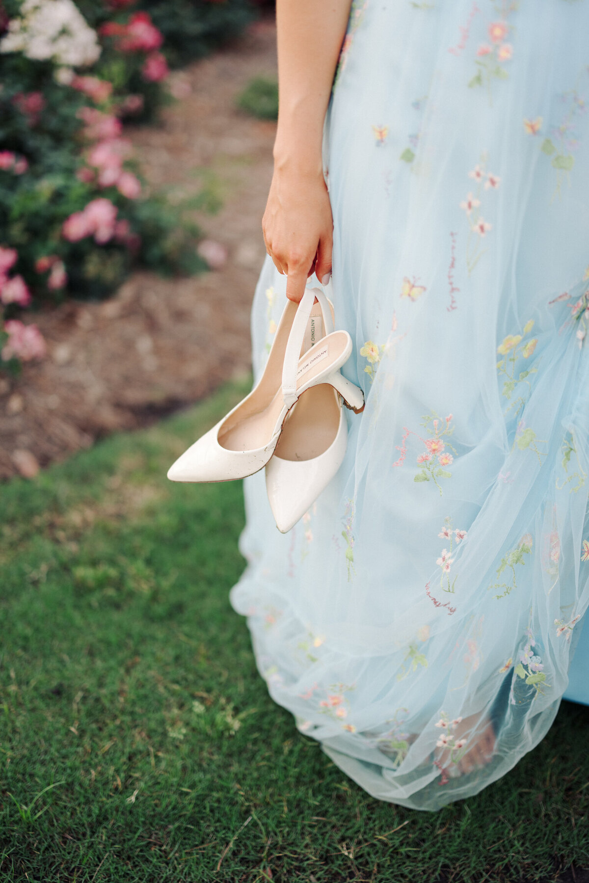 A picturesque engagement session set amidst the lush landscapes of Koasati Pines Golf Course, capturing love and elegance on film by Morgan Alysse, Louisiana film photographer.