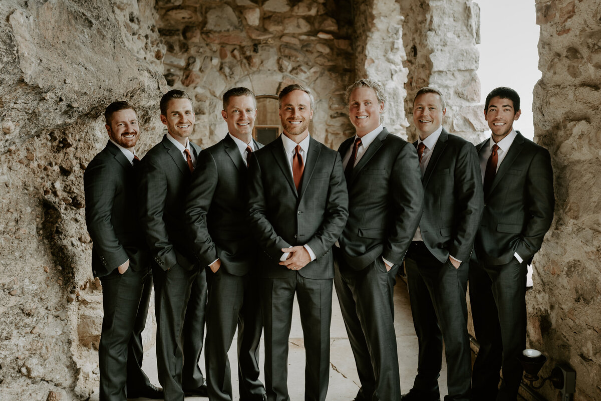 Groomsmen pose at Cherokee Ranch and Castle.
