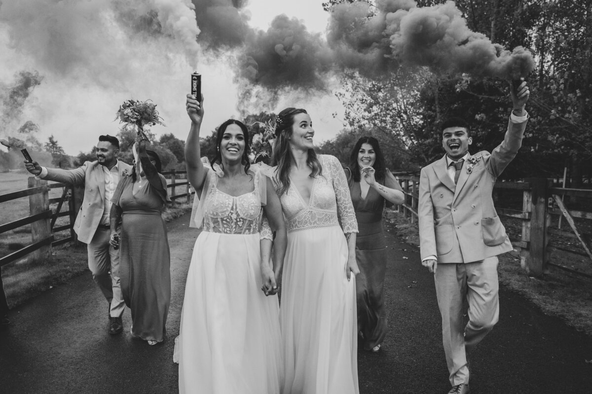 Smoke bombs with their bridal party