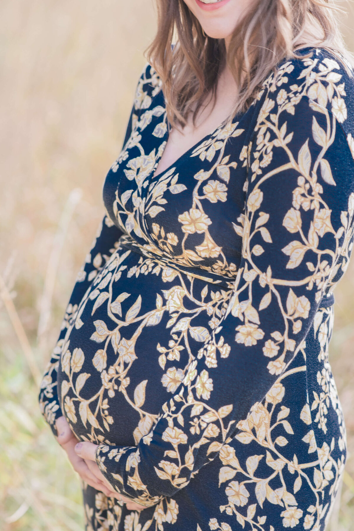 35 weeks pregnant belly on a royal blue dress